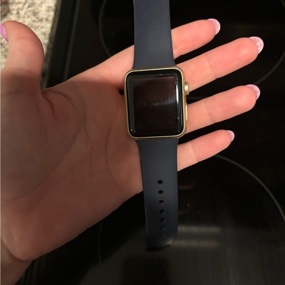 Apple Gold and Blue Smartwatch with Sleek Design